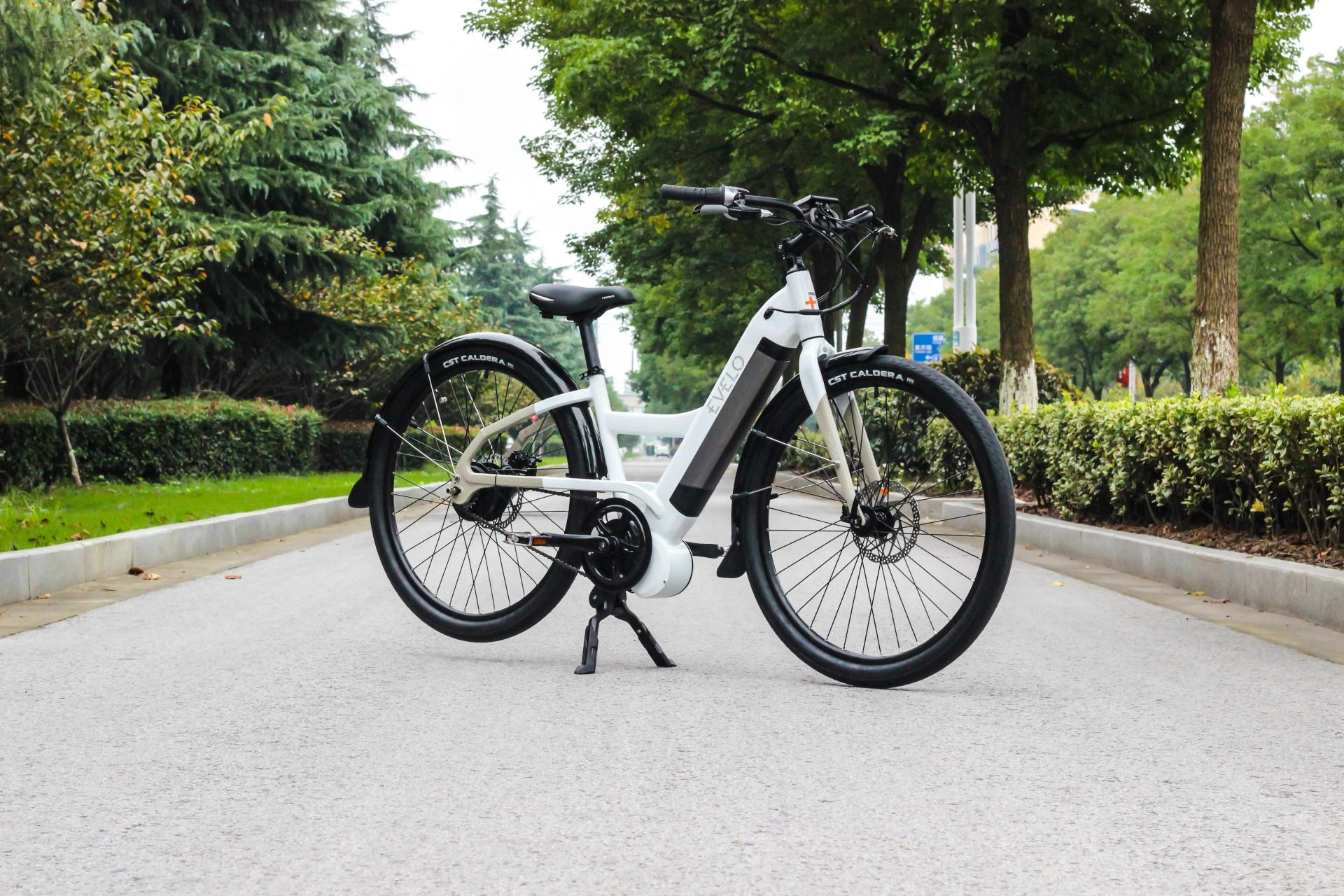 a bicycle parked on the side of a road